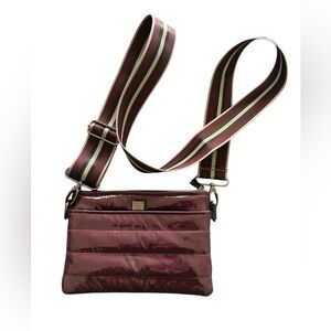 THINK ROLYN patent cross body bag